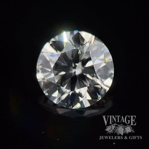 .73 carat, round brilliant, I color, SI1 clarity, natural diamond