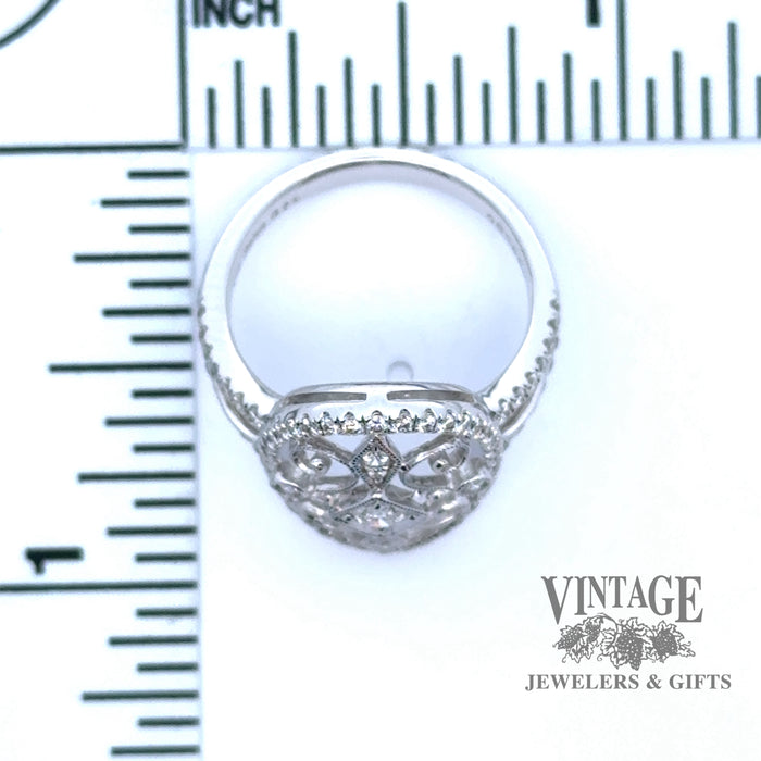 Oval filligree 18kw gold diamond ring scale