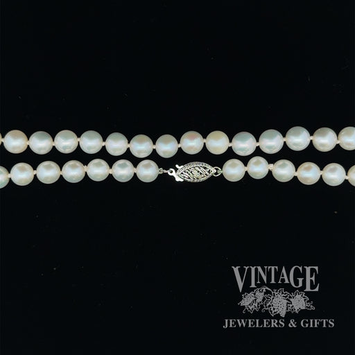 19” white 6.3 mm pearl strand with 14kw gold clasp