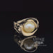 Revolving video of 14 karat yellow gold pearl freeform ring