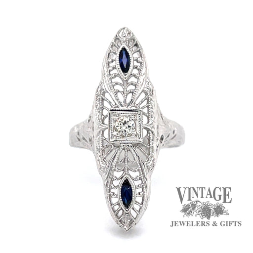 18 karat white gold vintage filigree elongated sapphire and diamond ring