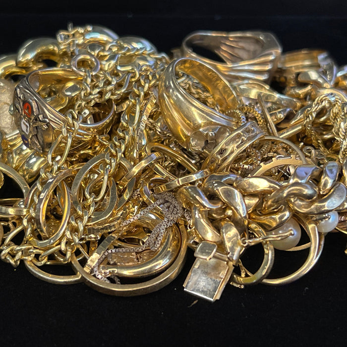 Pile of scrap gold jewelry