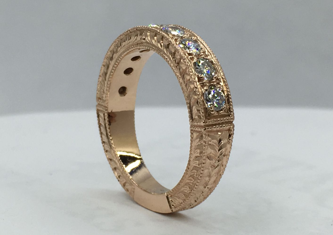 Making a hand engraved rose gold and pave diamond ring