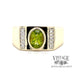 Bezel set Peridot wide ring in 10k with Diamond accents FRONT