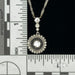 18kw gold antique 1.12ctw diamond halo pendant with scale