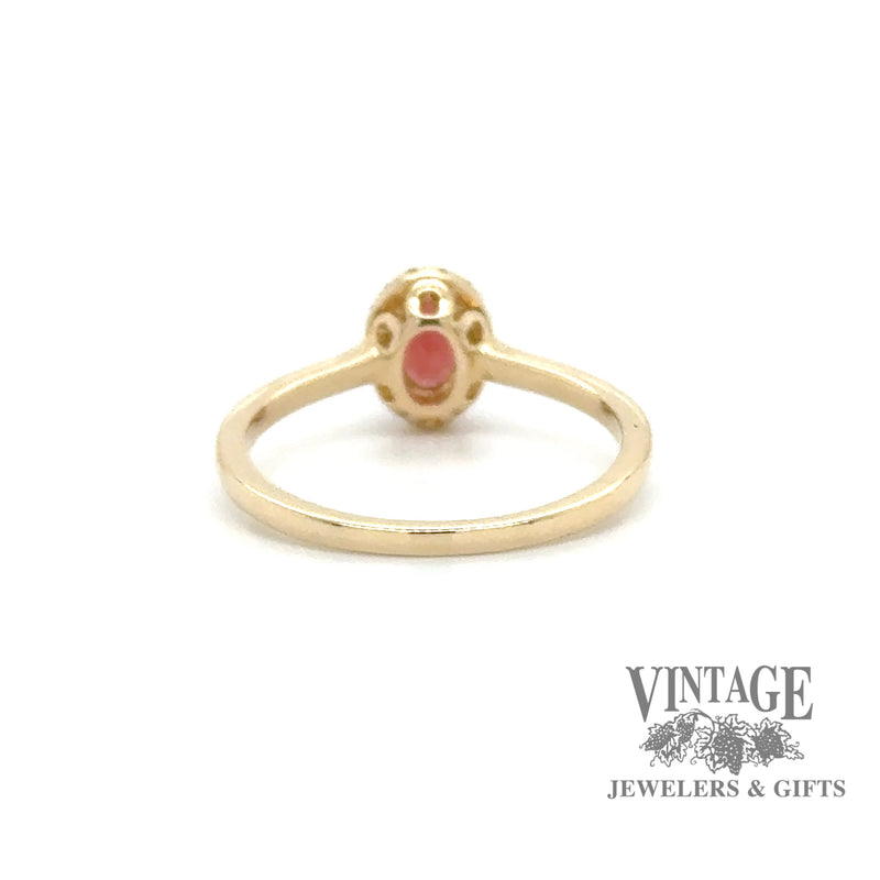 Oval garnet and diamond 14ky gold halo ring bottom
