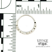 Filigree scroll platinum and diamond ring scale