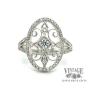 Oval filligree 18kw gold diamond ring