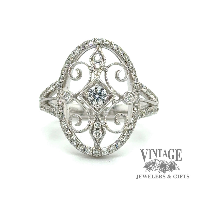 Oval filligree 18kw gold diamond ring