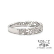 Filigree scroll platinum and diamond ring side