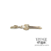 Small 14k gold Roman cross pendant side.