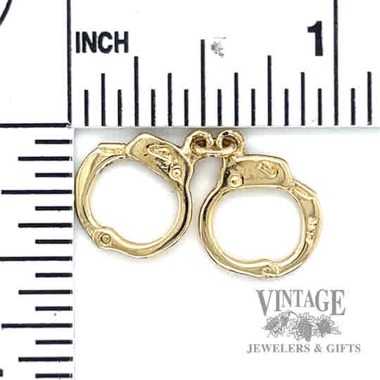 Hand Cuffs 14k gold pendant size and scale