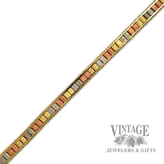 7.5" Articulated link 14k Tri gold bracelet