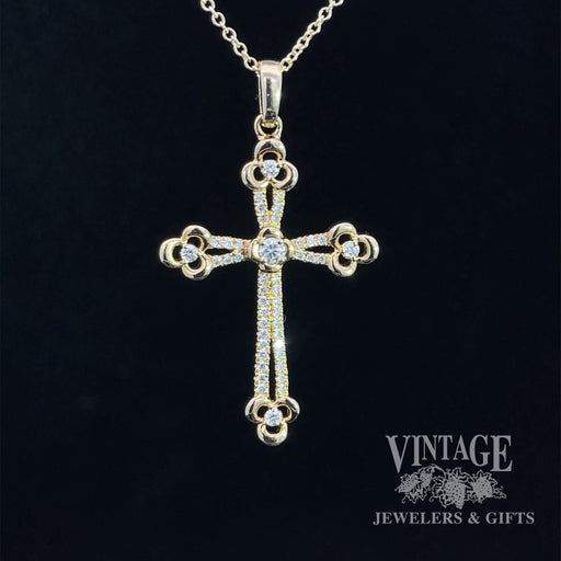 Diamond and 14ky gold cross necklace.