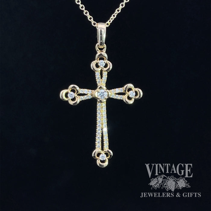 Diamond and 14ky gold cross necklace.