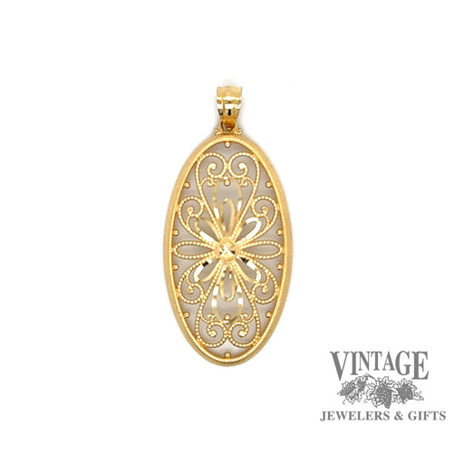 Oval 14ky gold filigree pendant