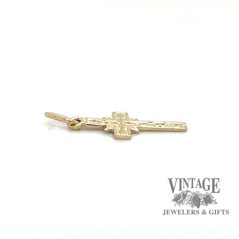 Small embossed 14k gold cross pendant side