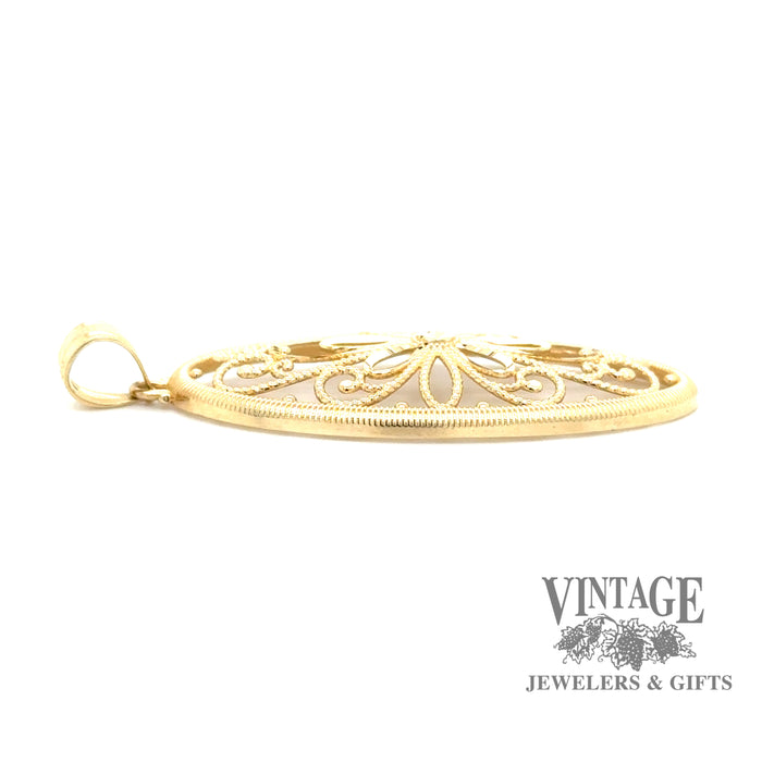 Oval 14ky gold filigree pendant, side view