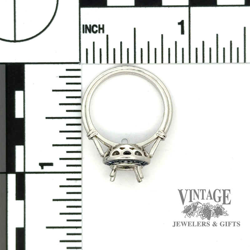 Diamond and caliber cut sapphire halo platinum ring scale