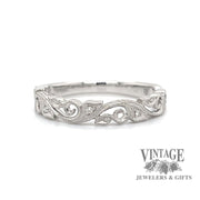 Filigree scroll platinum and diamond ring