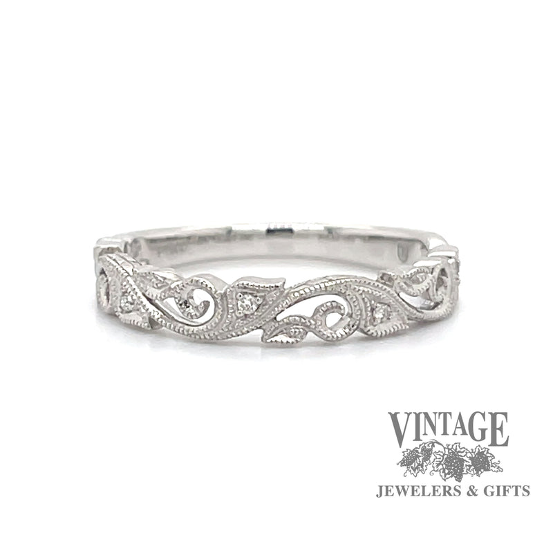 Filigree scroll platinum and diamond ring
