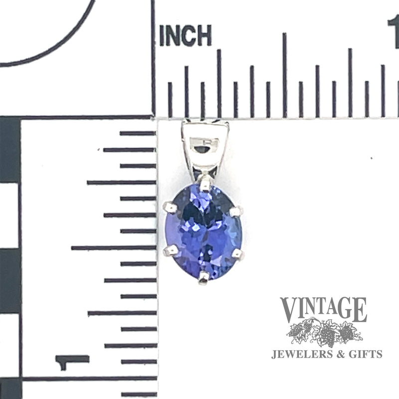 2.24 carat oval tanzanite 14kw gold pendant scale