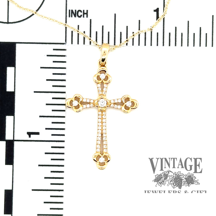Diamond and 14ky gold cross necklace scale