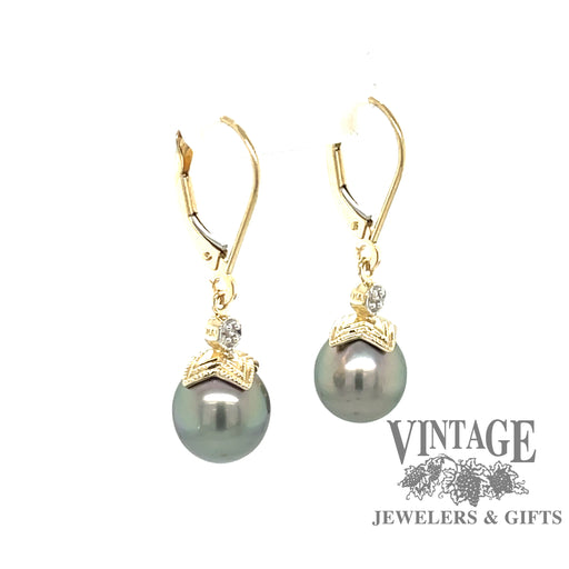 14 karat yellow gold black pearl and diamond drop earrings, angled view