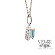 Aquamarine and diamond oval 18kw gold pendant side