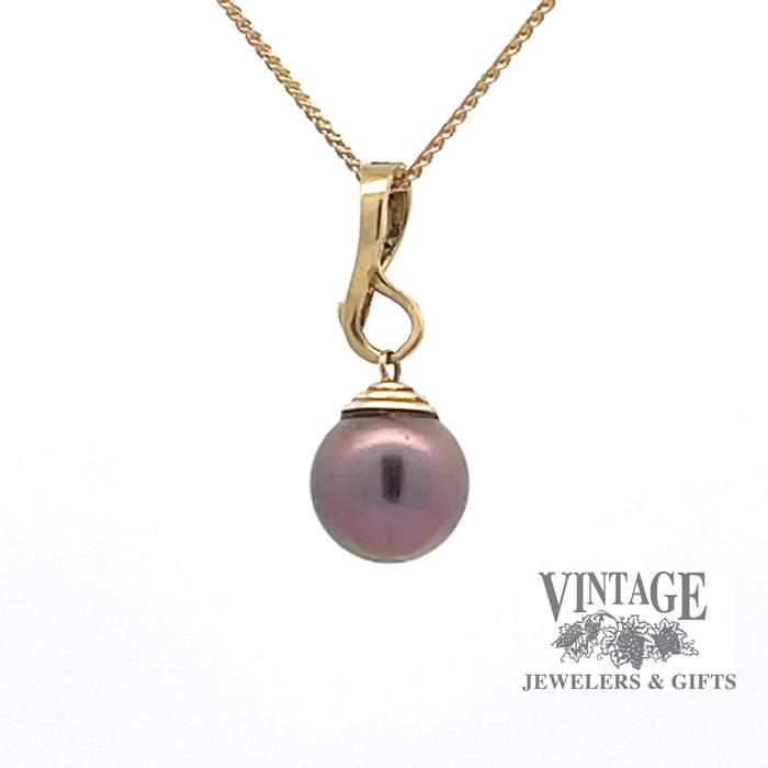 14k hinged pendant with purple/grey pearl front