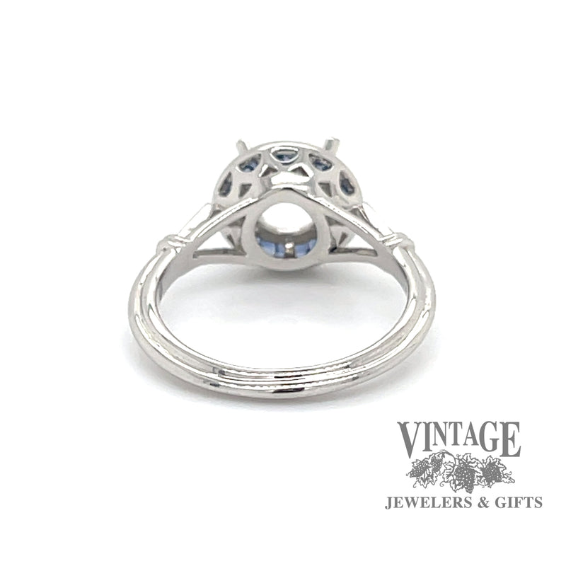 Diamond and caliber cut sapphire halo platinum ring bottom