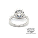 Diamond and caliber cut sapphire halo platinum ring bottom