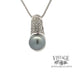 14k white gold and grey pearl pendant with diamond accents front