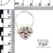 Ruby and diamond 14kw gold ballerina ring scale