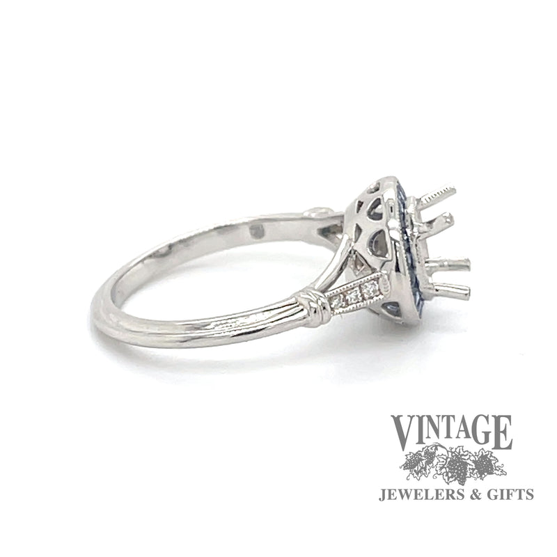 Diamond and caliber cut sapphire halo platinum ring side