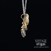 Multi colored diamond pave circular pendant side