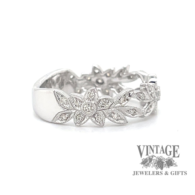 Floral pierced 14kw gold and diamond ring side