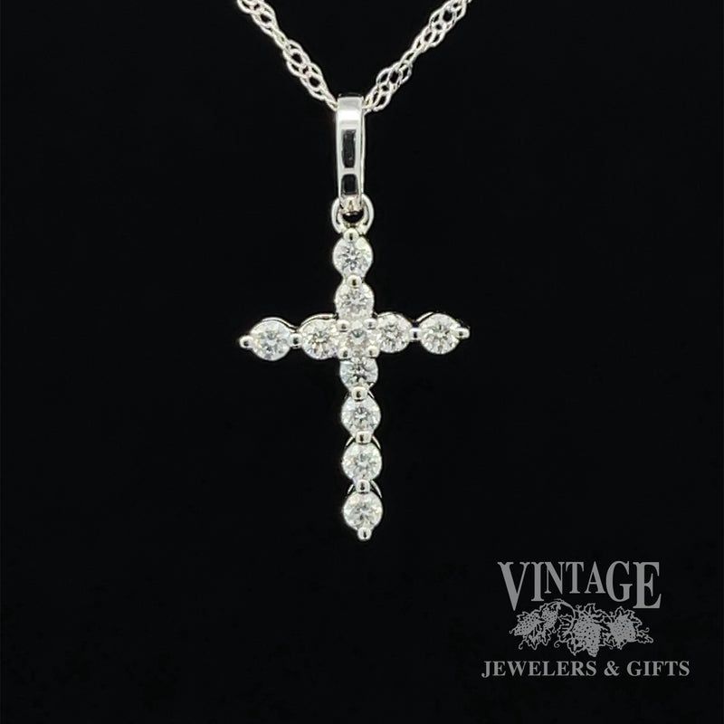 Diamond and 14kw gold “bubble” style cross necklace