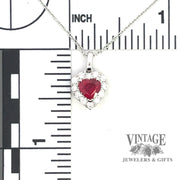 Heart shaped natural ruby and diamond 14KW gold pendant scale