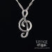 Music note 14 karat white gold and diamond necklace back