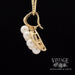 10k pearl cluster pendant with diamond accent side view