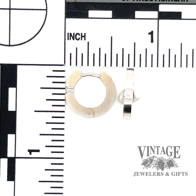 Contemporary 18kw gold and diamond clip earrings scale