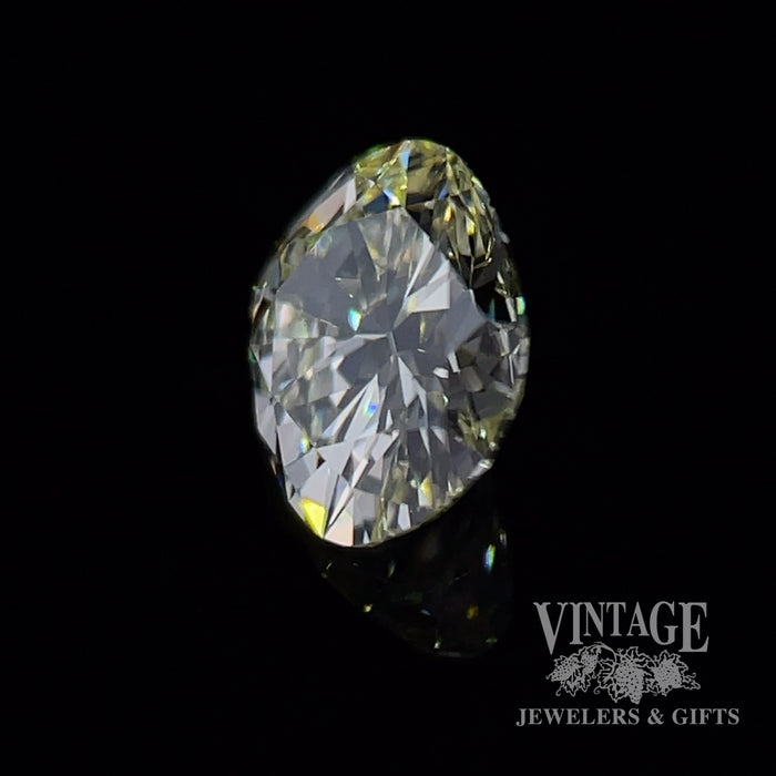 .77 carat, cushion brilliant, U/V color, VS1 clarity, natural diamond