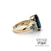 10ky gold London blue pear shaped and diamond ring, side view
