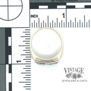 Vintage two diamond illusion 14ky ring scale