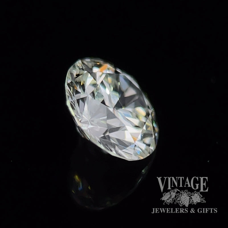 .73 carat, round brilliant, I color, SI1 clarity, natural diamond