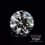 1.29 carat, round brilliant, M color, SI1 clarity, natural diamond