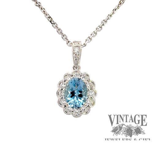 Aquamarine and diamond oval 18kw gold pendant