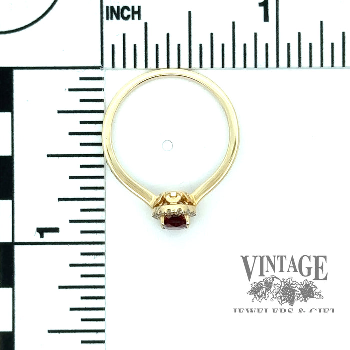 Oval garnet and diamond 14ky gold halo ring scale