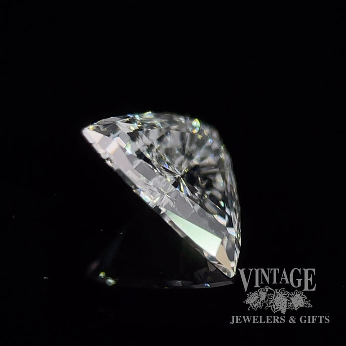 .75 carat, H color, SI1 clarity, triangle shaped, natural diamond side